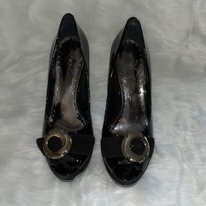 Black patent and suede BCBGirls platform peep toe pumps